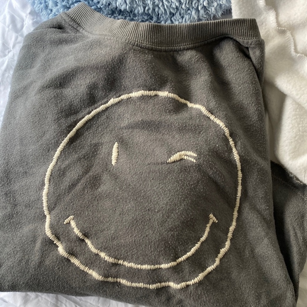 Small cropped winky face sweatshirt